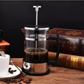 Compact 350ml glass pour-over coffee maker with stainless steel filter