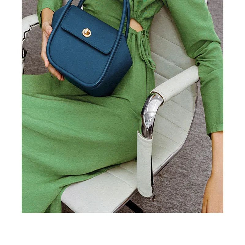Cow leather wing shape tote bag with cross-body strap in one of four colour options