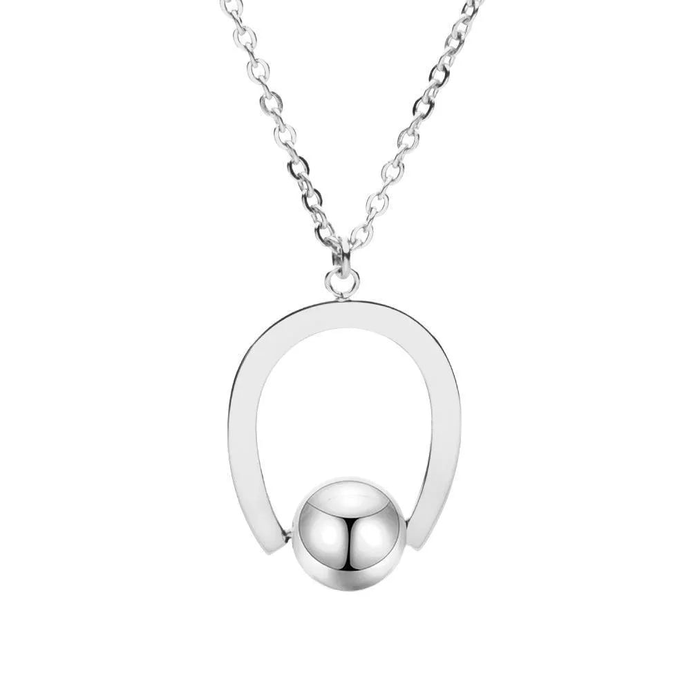 Gold or silver geometric stainless steel necklace on an adjustable cross chain.