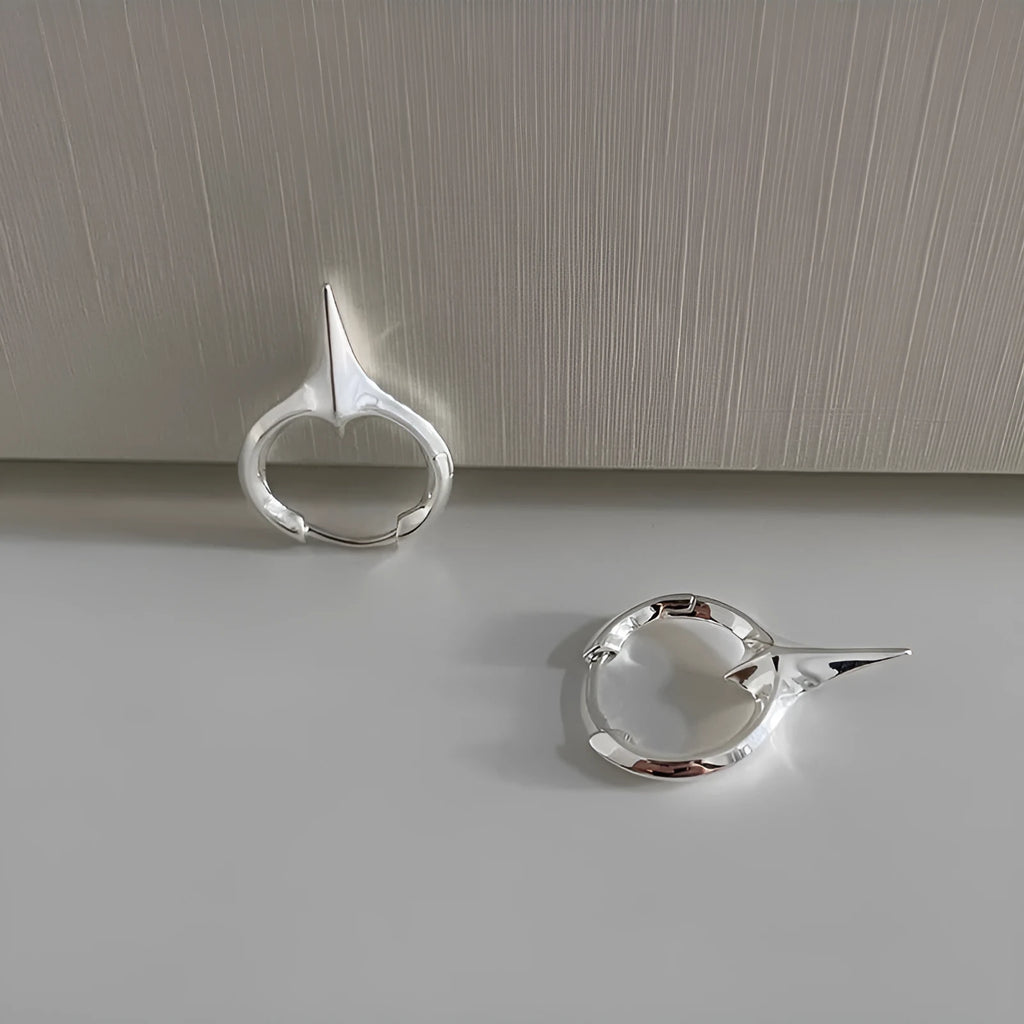 Women's geometric star clip earrings with electroplated white gold plating on copper material