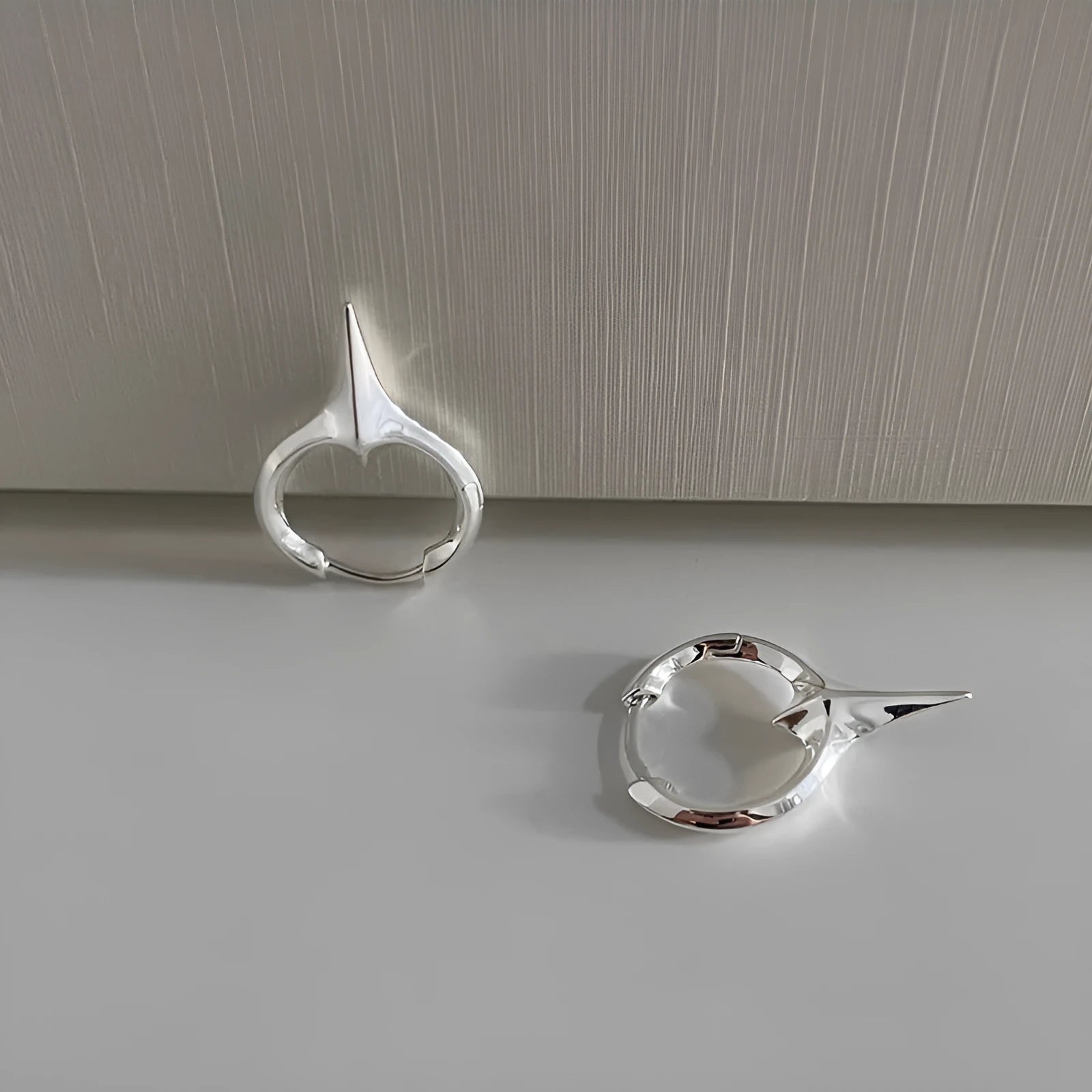 Women's geometric star clip earrings with electroplated white gold plating on copper material