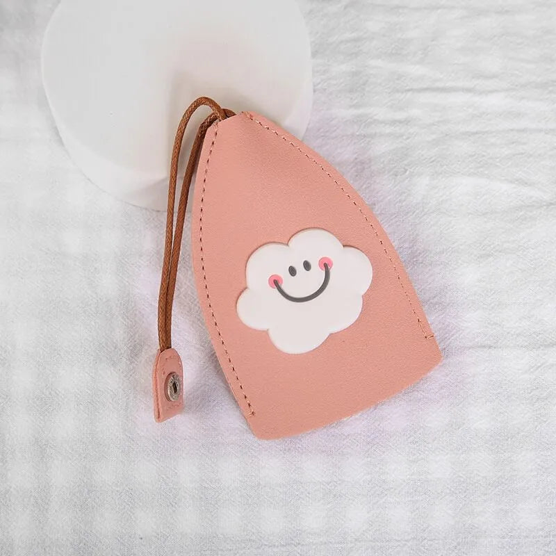 Colourful cartoon pull-out key case made from PU leather, showing the key extended from its protective sleeve.