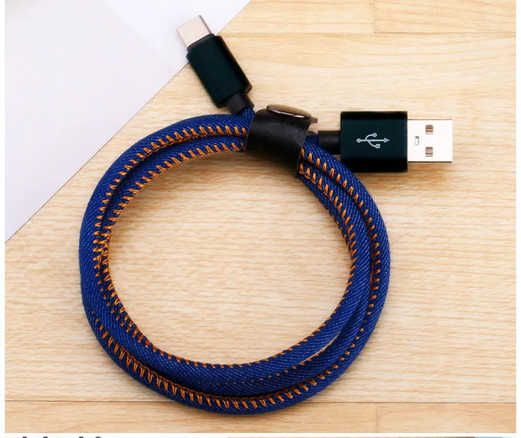 Cowboy-style denim braided USB-C charging cable in black with aluminium connectors.