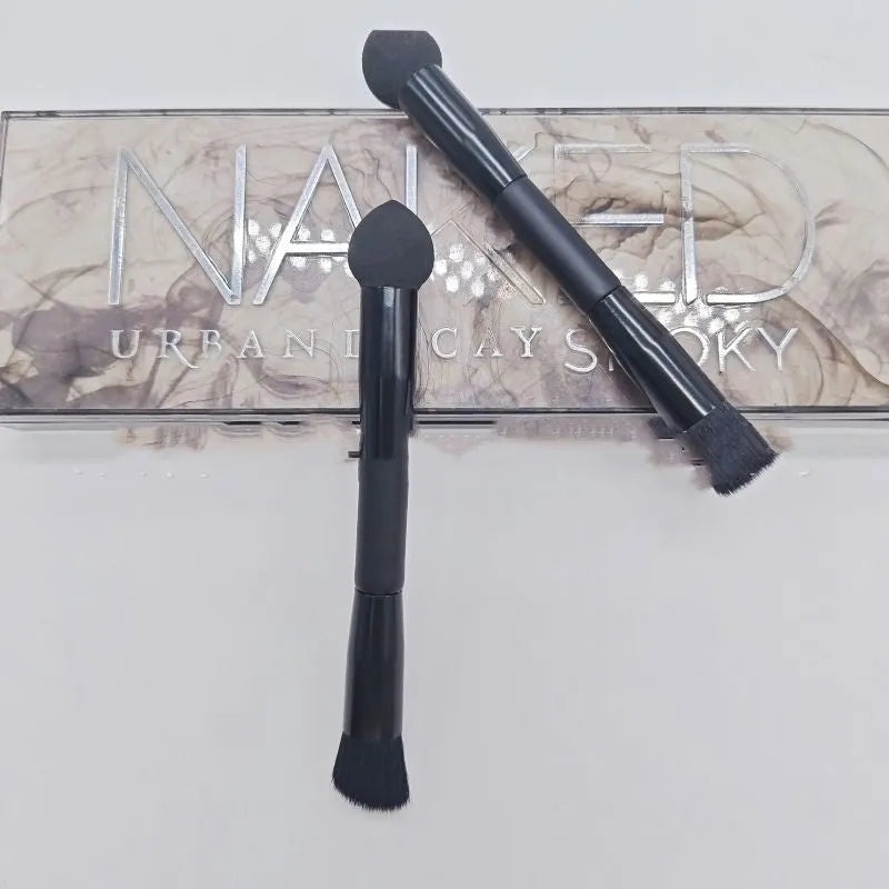 Black sponge tip concealer brush with wooden handle for makeup application.