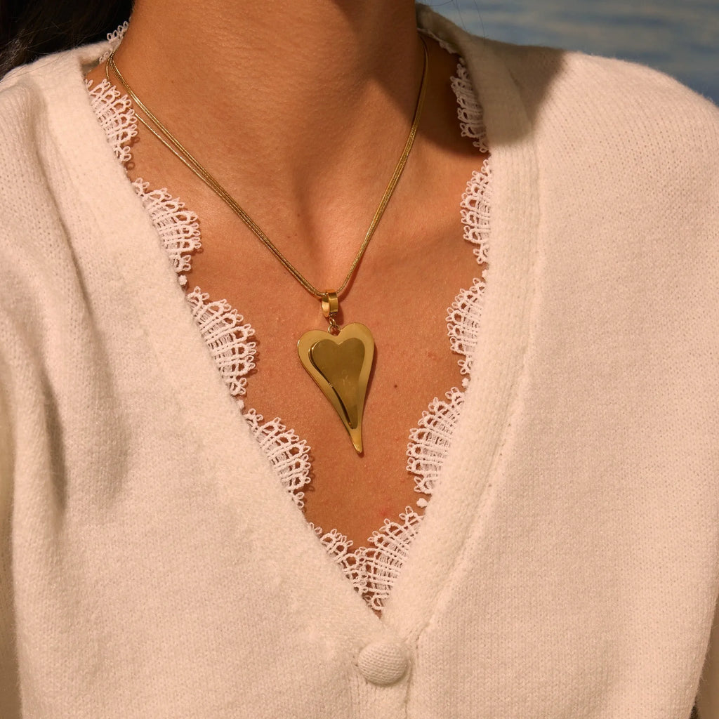 Stainless steel women's necklace with geometric double heart pendant and snake bones chain in gold or steel finish