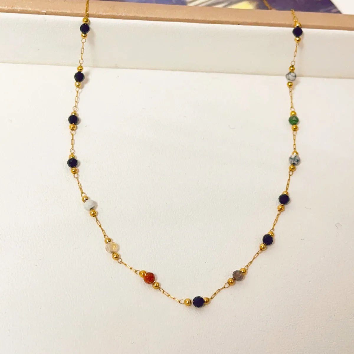 Gold titanium steel women's necklace with natural stone pendant on O-ring chain