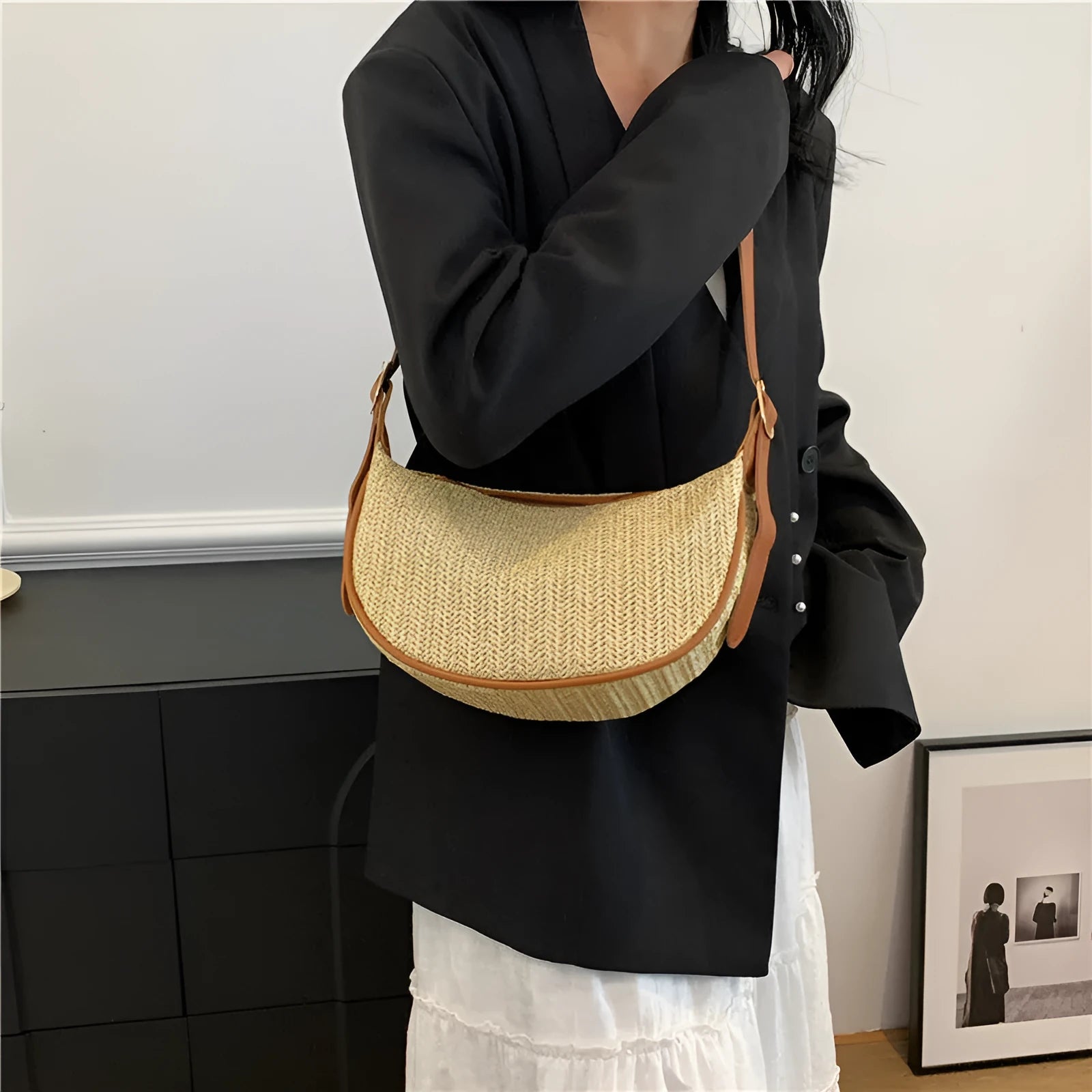 Women's straw woven crossbody bag showing woven texture and internal organisation with phone pocket