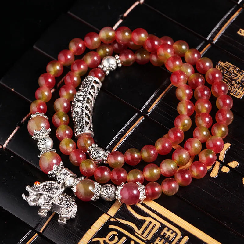 Handmade natural watermelon crystal bracelet with Chinese knot design and geometric beads