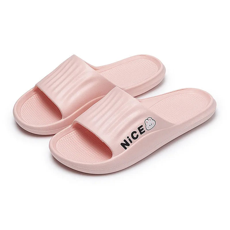 Unisex adult EVA flip flop slippers with cartoon pattern in multiple colours on a non-slip sole.