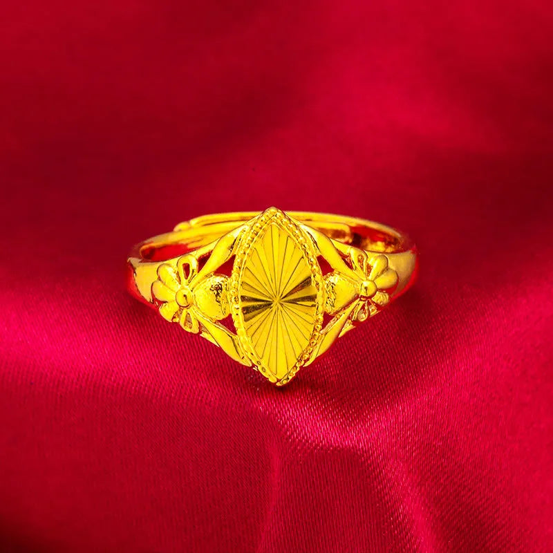 Gold electroplated brass ring with open diamond flower design and alluvial texture pattern