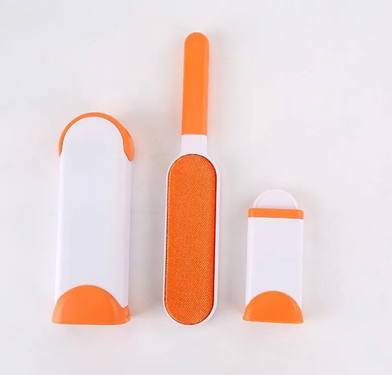 Blue reusable pet hair removal comb with a large double-sided sticky brush and a self-cleaning base unit.
