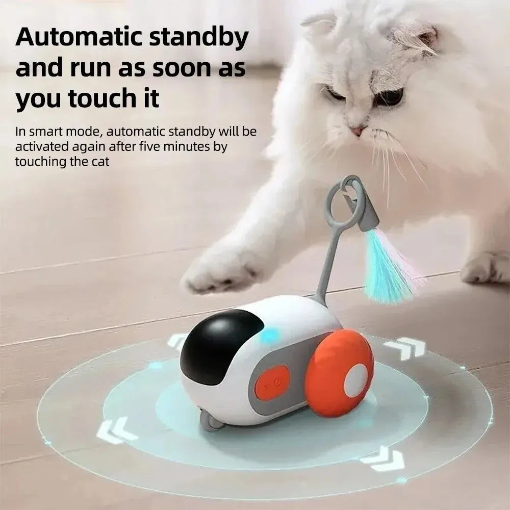 Blue smart cat toy car with feather teaser attachment and remote control on white background