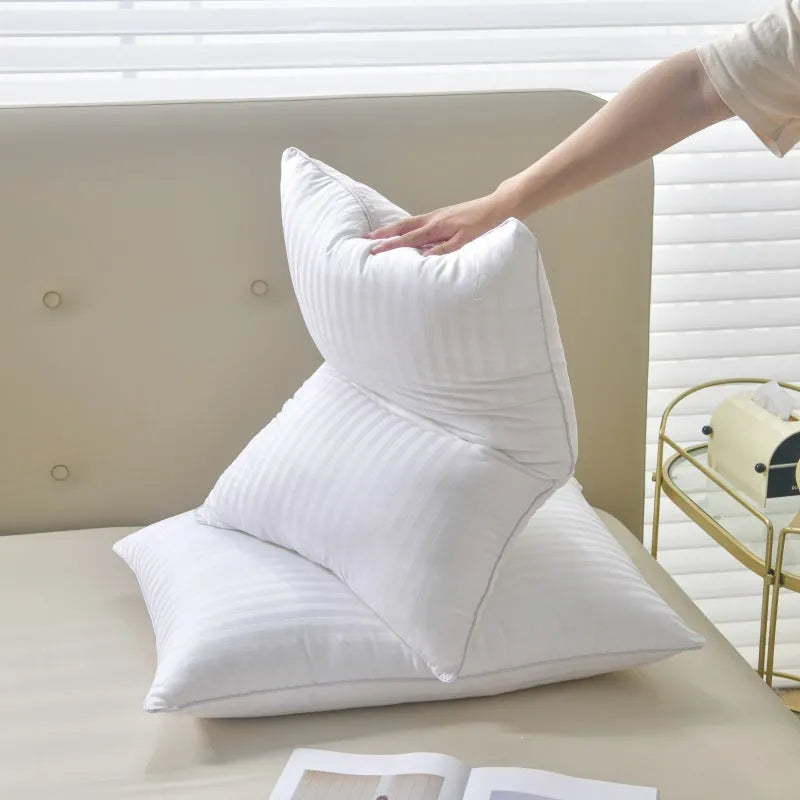 White cotton satin stripe pillow with feather and cotton fill, shown in three different sizes.