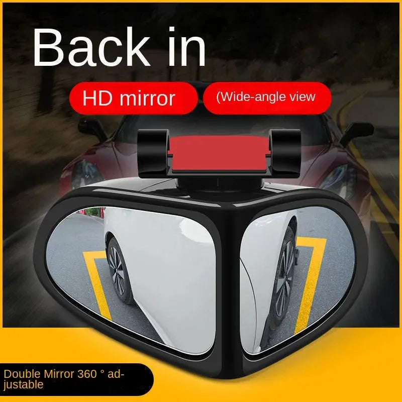 Adjustable wide-angle car reversing mirror on a vehicle, showing black ABS shell.