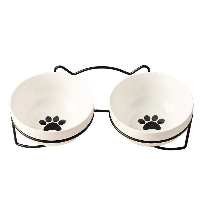 Ceramic pet bowl with iron frame featuring cat footprints pattern
