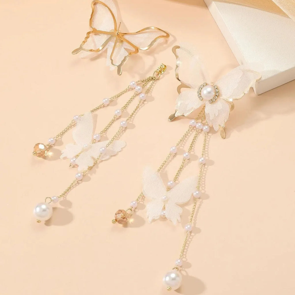 White butterfly earrings with tassel lace, pearl and rhinestone decoration on copper alloy