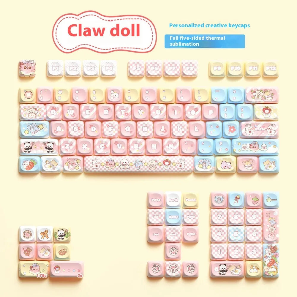 Clip doll themed mechanical keyboard keycaps with colourful doll artwork on key surfaces