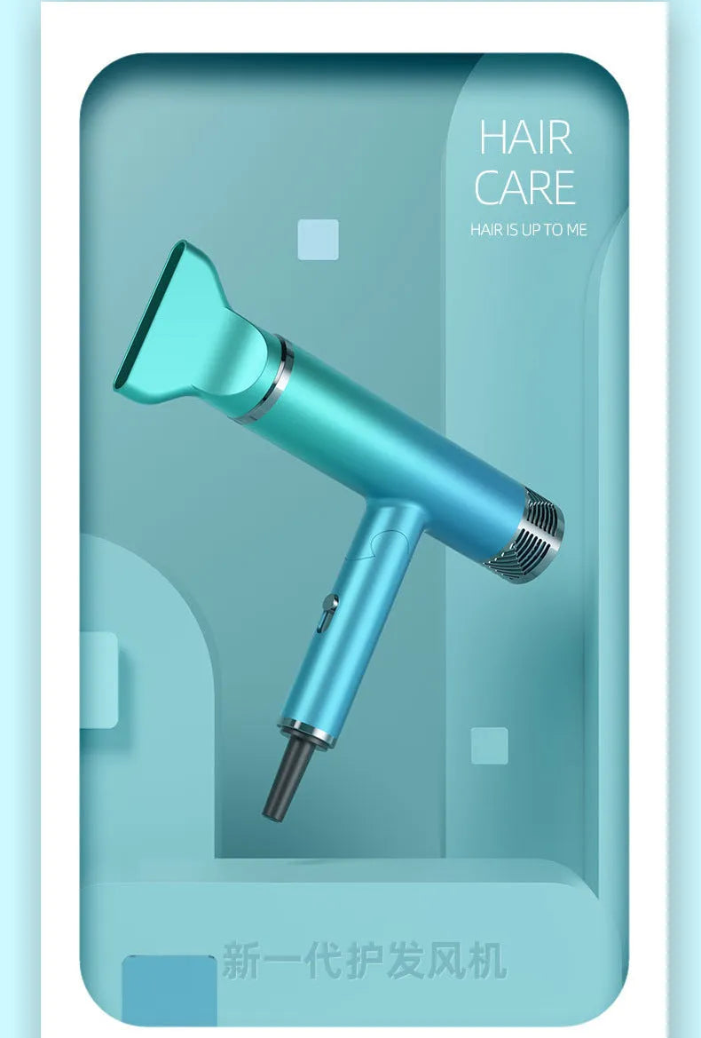 Green and purple foldable hair dryer with collapsed handle next to a suitcase, showing its compact travel size.