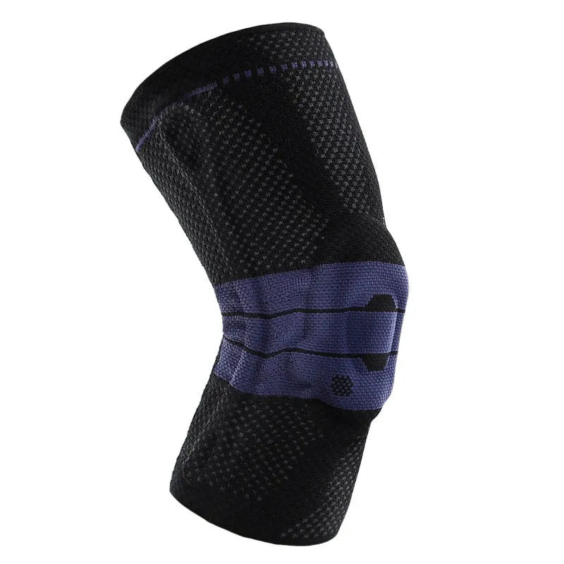 Black and blue adult sports knee pad made from nylon and spandex, shown on a knee.