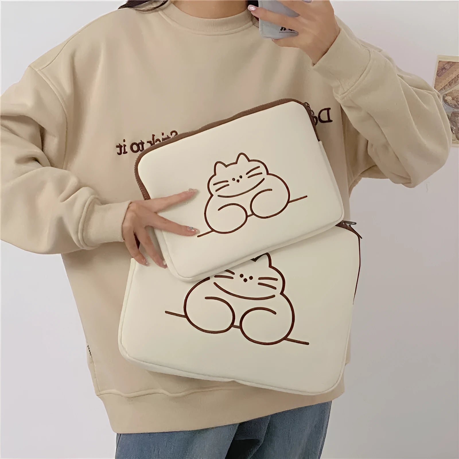 Embroidered animal tablet protective sleeve with zipper closure in fat cat and sleepy cat designs