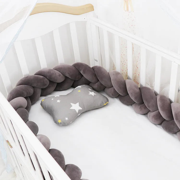 Baby crib bumper in crystal velvet with braid knot design showing flexible length options for cot protection