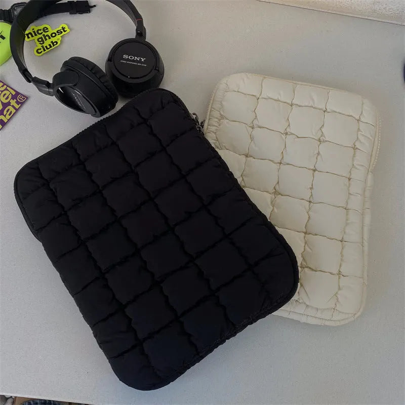 Large black and white nylon laptop bag showing cloud cotton storage compartment, suitable for 11 to 15.6 inch computers.
