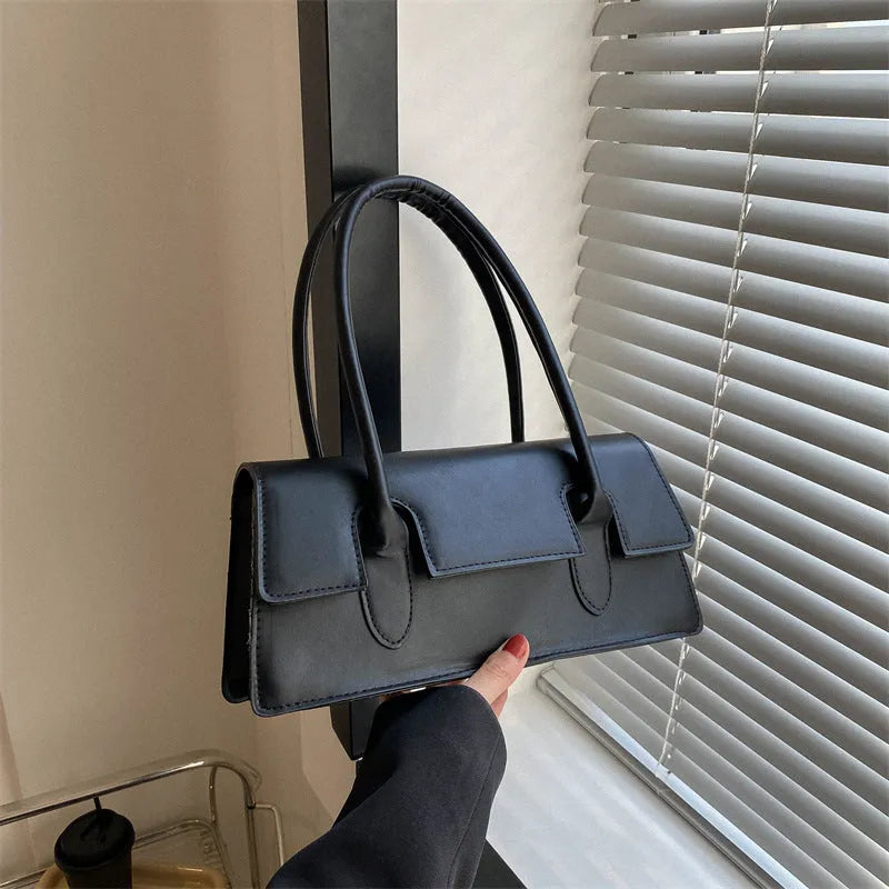 Women's small horizontal square shoulder bag in PU leather with visible stitching in a choice of colours
