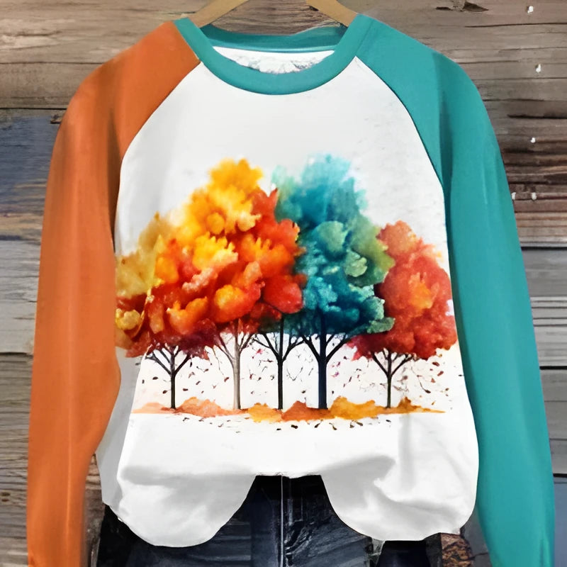 Green women's pullover hoodie with a large 3D cartoon character print on the front.