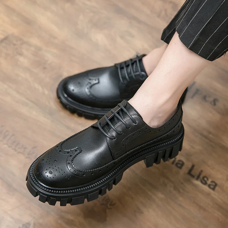 Men's black business brogue leather shoes with round toe design on white background