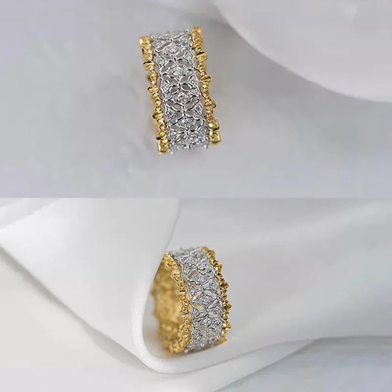 Gold two-tone geometric zircon ring on a copper band, showing round design detail.