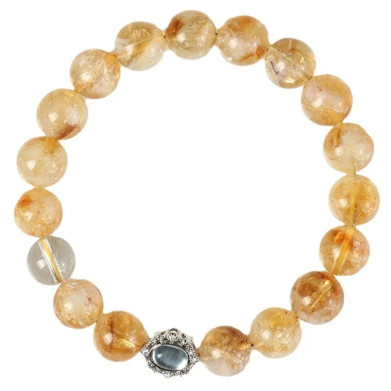 Geometric citrine crystal bracelet with 10mm polished stones on wrist