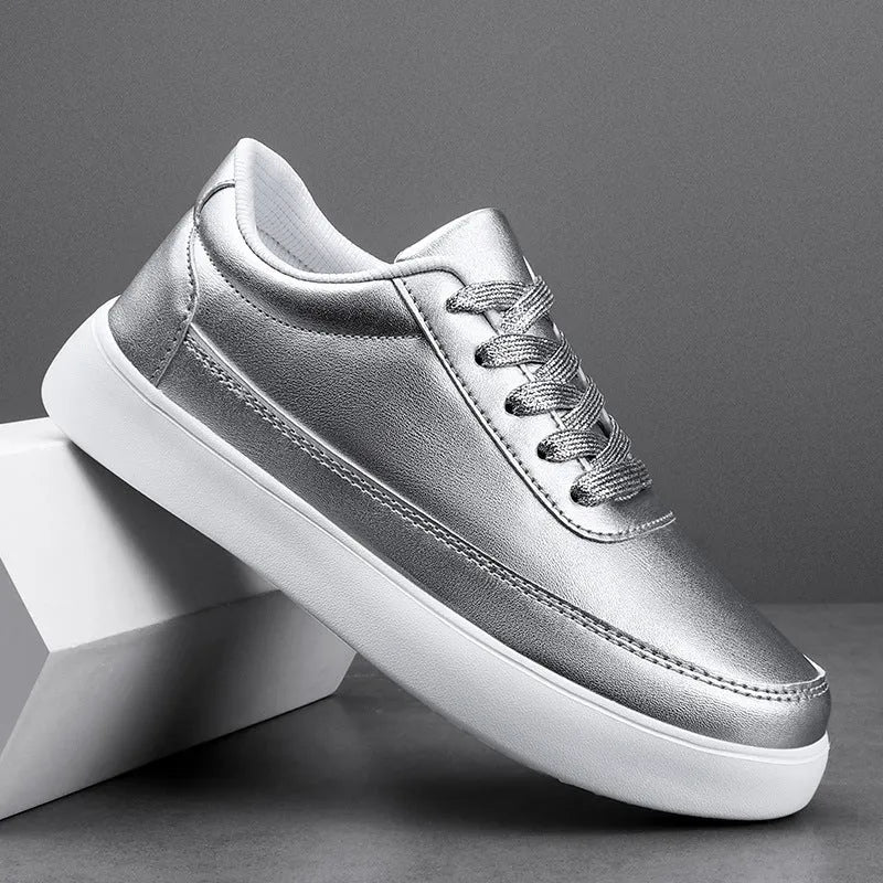 Women's white leather lace-up casual flat shoes on a plain background