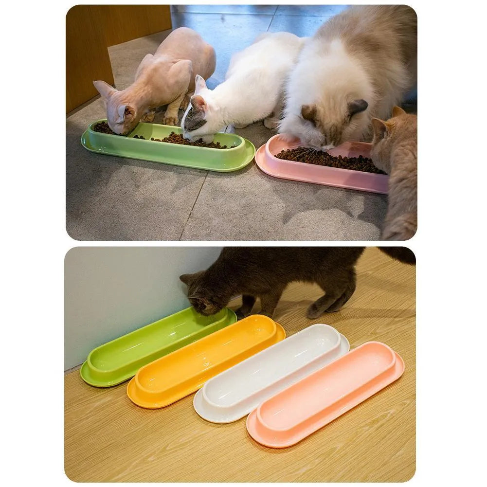 Green, pink, and yellow leakproof pet bowls with anti-slip bases for cats and dogs.
