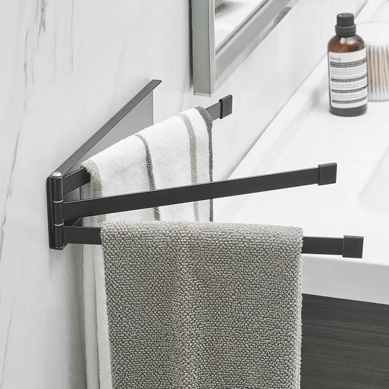 Nordic folding towel rack in carbon steel with black or white finish, mounted with adhesive without drilling