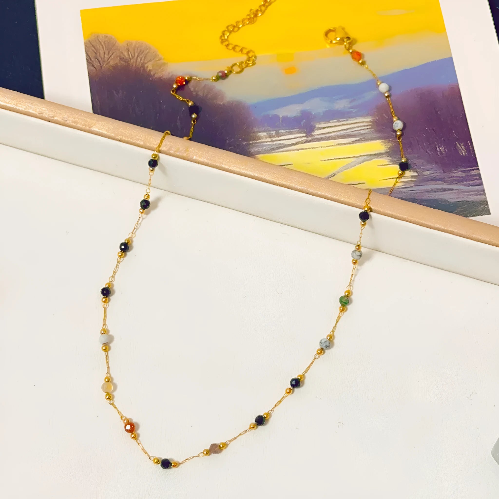 Gold titanium steel women's necklace with natural stone pendant on O-ring chain