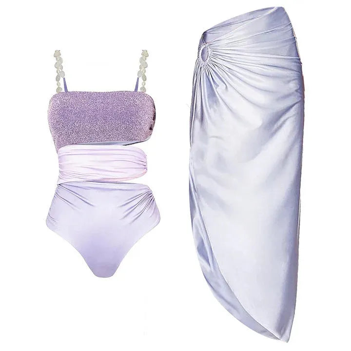 Purple one-piece swimsuit with matching wrap skirt made from quick-drying polyester fabric
