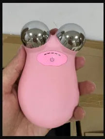 Pink and white micro current facial lifting and firming beauty instrument device.
