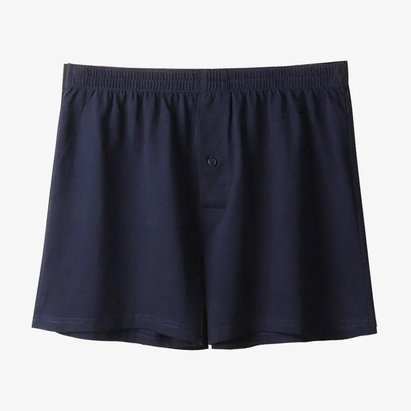 Men's cotton boxer shorts in light grey, dark blue and black colours showing high waist loose fit design