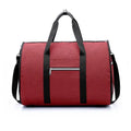 Red cylinder-shaped travel bag made from Oxford cloth with a zipper closure.
