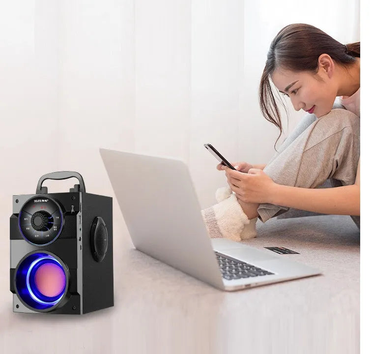 Black portable mini audio system with subwoofer, main box, satellite box, and 1.2 metre connection cable.
