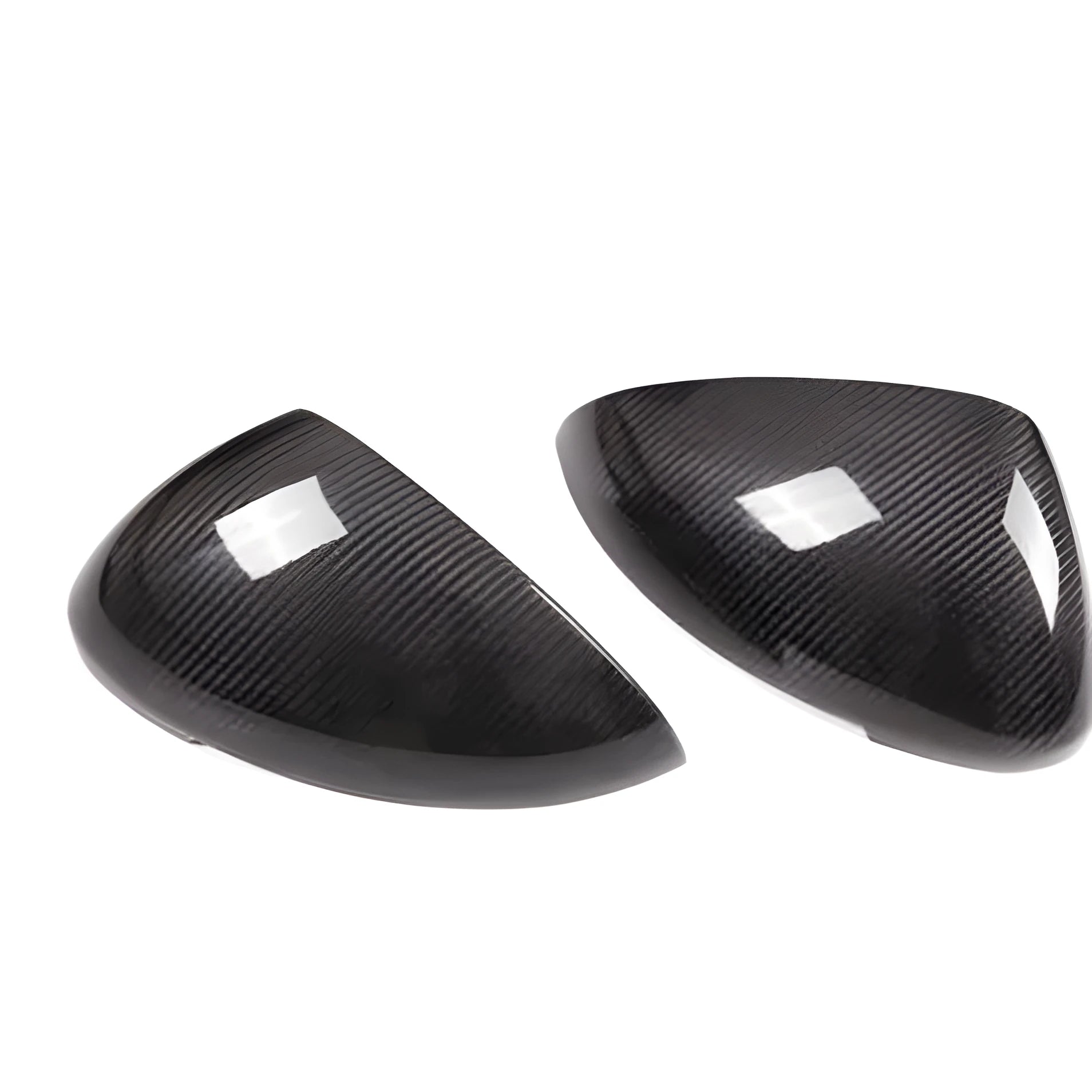 Genuine carbon fibre rearview mirror covers for a Porsche Macan, showing glossy black weave texture.
