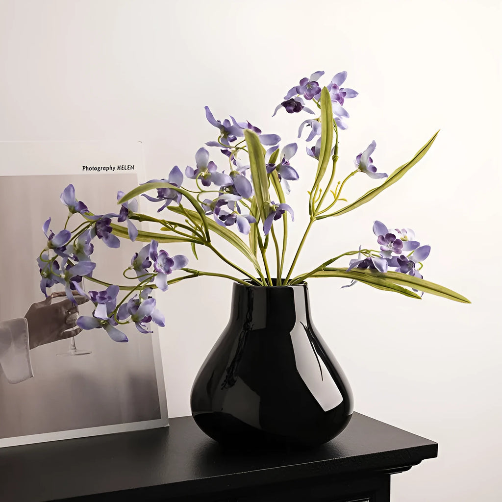 Ceramic decorative vase with glass surface in black or white colour with round belly French design
