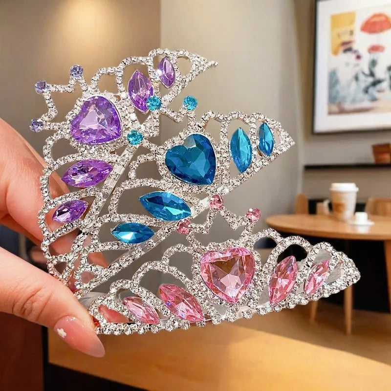 Children's alloy hair band with crystal crown in pink, light blue, or light purple.