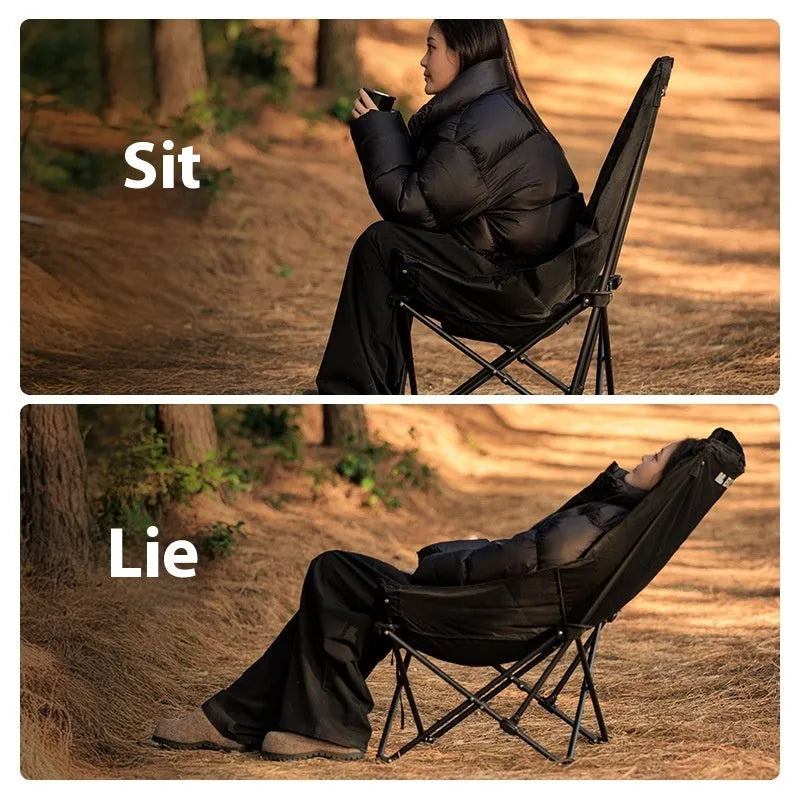 Night black Oxford cloth folding moon chair in camping and beach setting