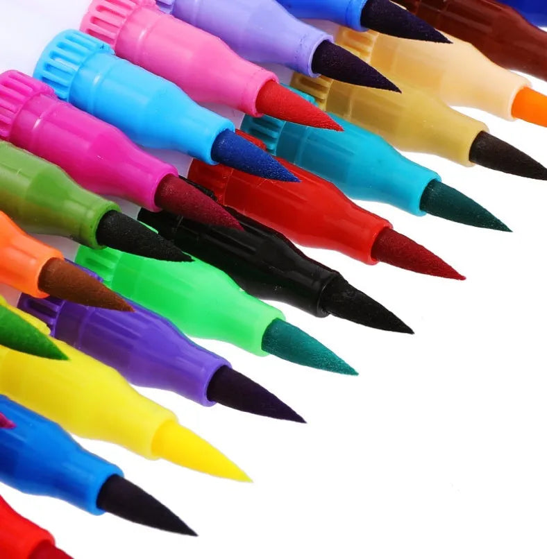 Set of watercolour brush pens in assorted colours, showing fine tips, arranged in a case.