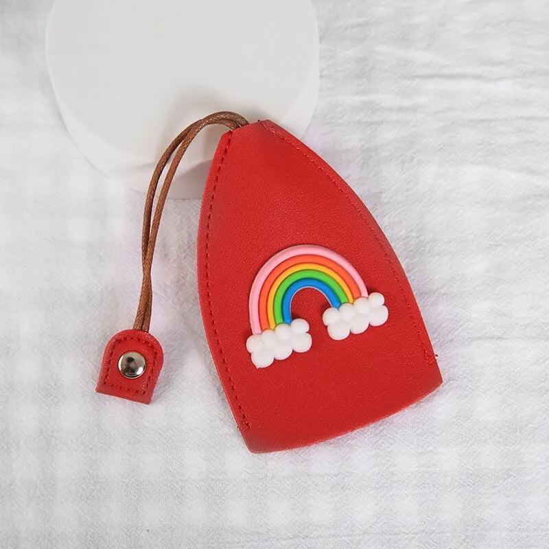 Colourful cartoon pull-out key case made from PU leather, showing the key extended from its protective sleeve.