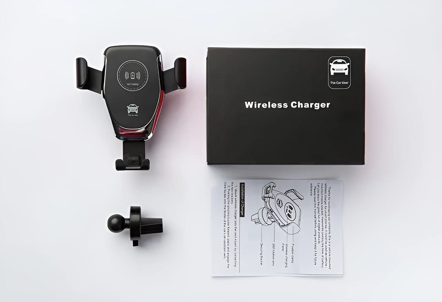 Black wireless car charger mounted on a car air vent, holding an iPhone.