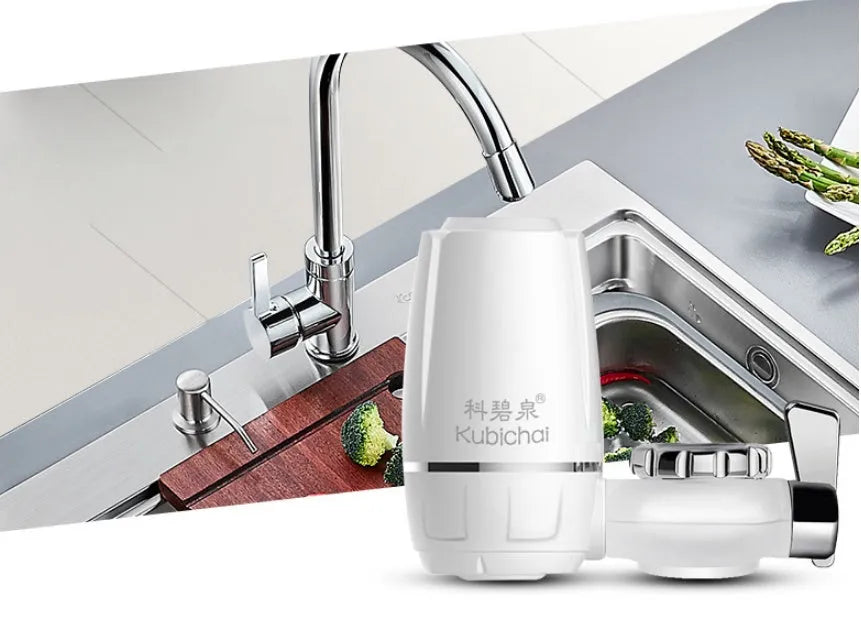 White faucet-mounted water purifier with ceramic filter and adapter kit for kitchen tap installation.