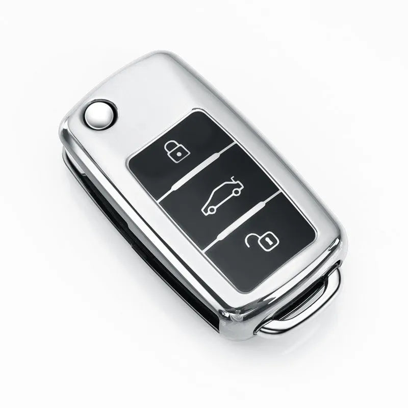 Volkswagen Model A folding key case in TPU material showing four colour options: silver, blue, pink, and red