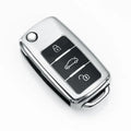 Volkswagen Model A folding key case in TPU material showing four colour options: silver, blue, pink, and red